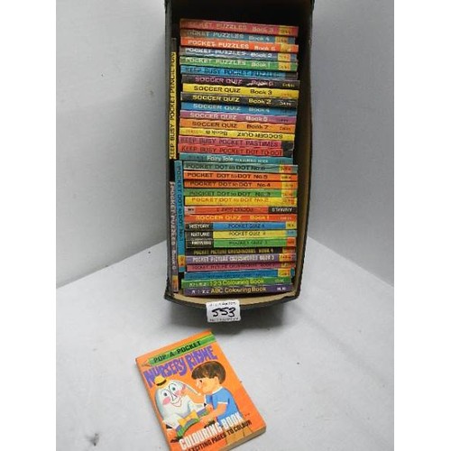 553 - A box of approximately 35 pocket puzzle books.