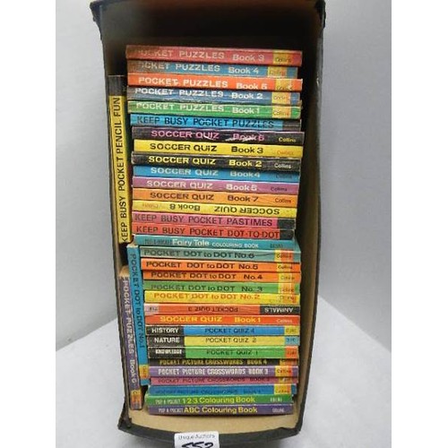 553 - A box of approximately 35 pocket puzzle books.