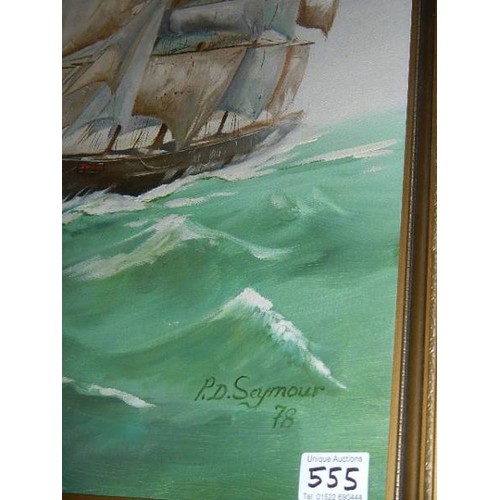 555 - An oil on board painting of a sailing ship signed P D Seymour.