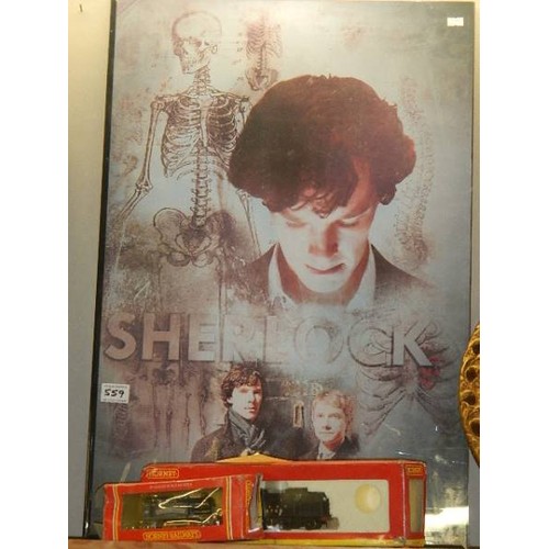 559 - A framed poster 'Sherlock'