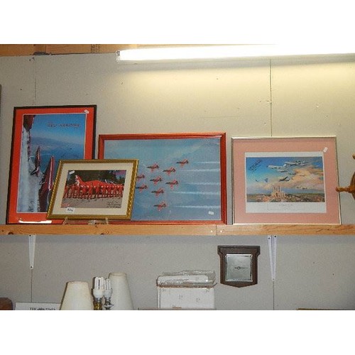 564 - Three framed and glazed prints of the Red Arrows (2 signed) and one airplane print.