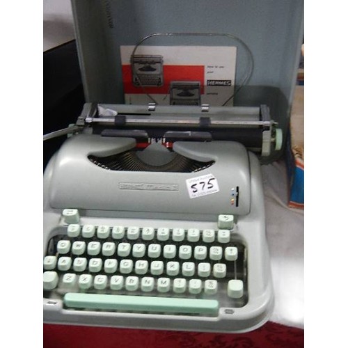 575 - A Hermes Media 3 typewriter.