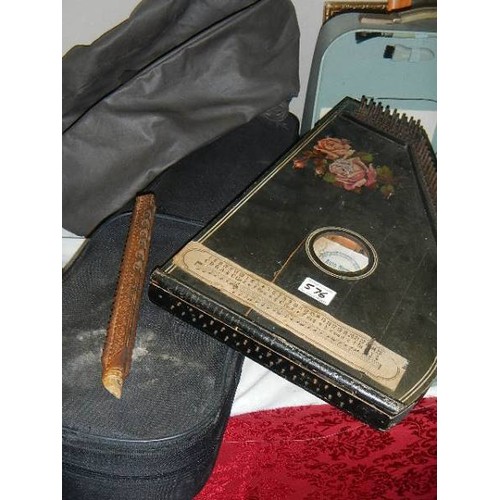 576 - A violin case, a soft case German harip and an early wooden recorder.