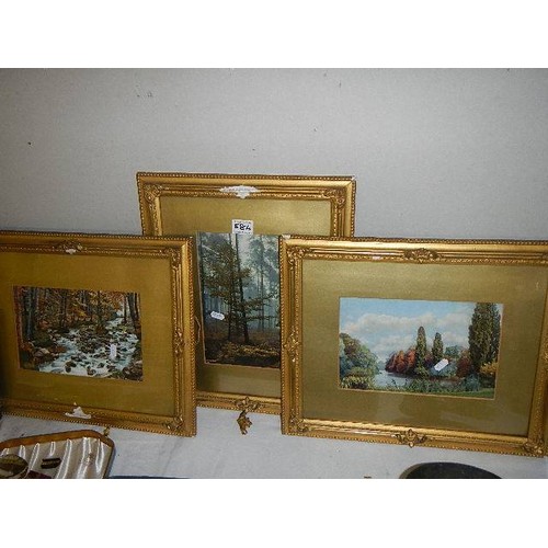 584 - Three framed and glazed rural scenes.