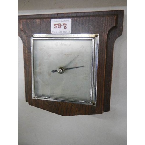 588 - A square wall barometer.