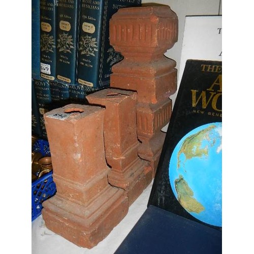 592 - Four terracotta pedestals.