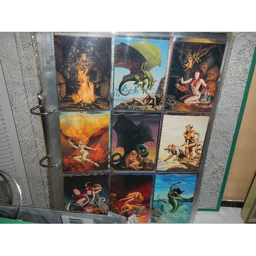 596 - Three folders of fantasy collector's cards.