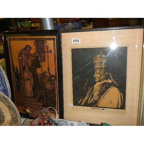 597 - A framed and glazed portrait of Pope Leo XIII and another religious print.