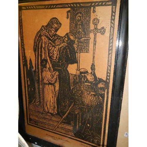 597 - A framed and glazed portrait of Pope Leo XIII and another religious print.