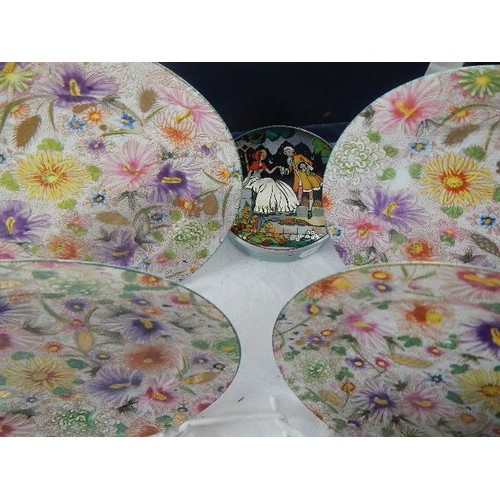 610 - A set of six Chinese tea plates and other ceramic items.