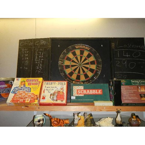 644 - A dart board and other games.