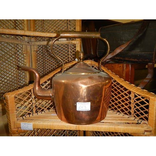 663 - A Victorian copper kettle.