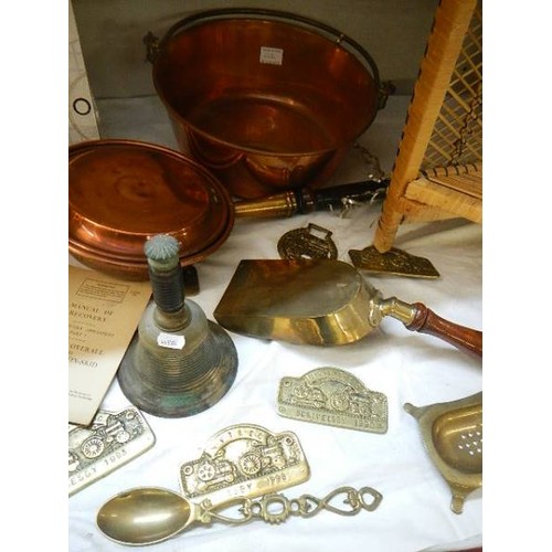 664 - A good lot of brass and copper including jam pan, warming pan etc.,