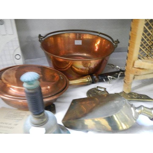 664 - A good lot of brass and copper including jam pan, warming pan etc.,