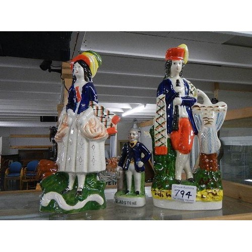 794 - Three Staffordshire figures.