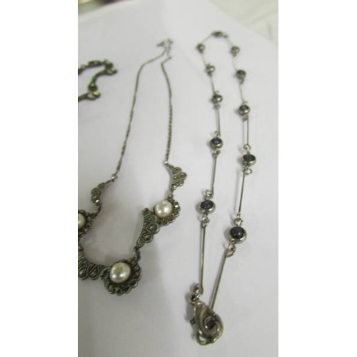 1001 - Four late 19th/early 20th century necklaces and two pairs of earrings.