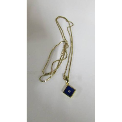 1003 - A 9ct gold pendant on 9ct gold chain, 2.6 grams. Length of chain 42cm