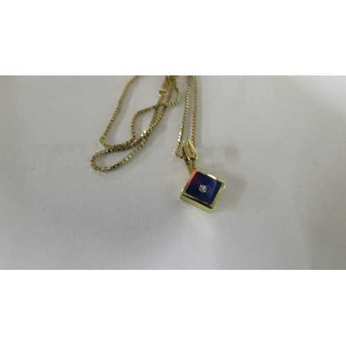 1003 - A 9ct gold pendant on 9ct gold chain, 2.6 grams. Length of chain 42cm