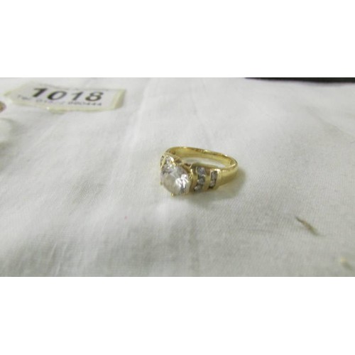 1018 - Two 9ct gold rings, sizes G and H, 11 grams total.