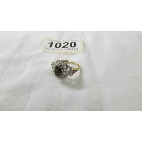 1020 - A yellow gold diamond and sapphire ring, size K, 3.2 grams (Hallmark indistinguishable)