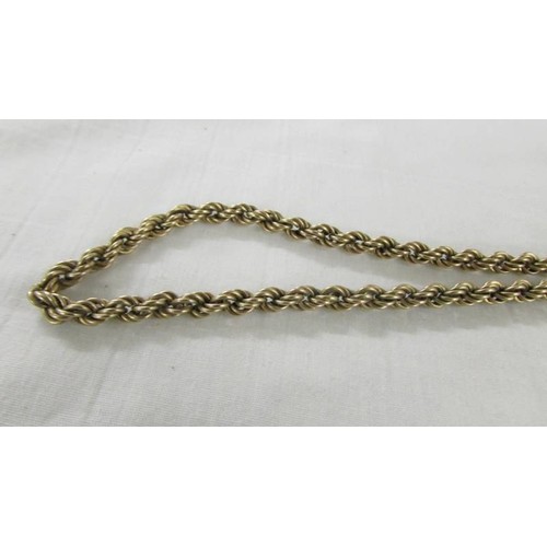 1027 - A 9ct gold 54 cm chain, 14 grams.