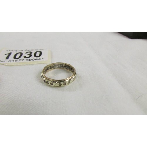 1030 - Two 9ct gold rings, sizes P & Q, 4.9 grams and an eternity ring, size Q.