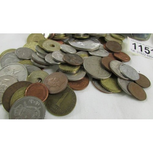 1151 - A mixed lot of mainly foreign coins and bank notes including Queen Mother £5 coin.