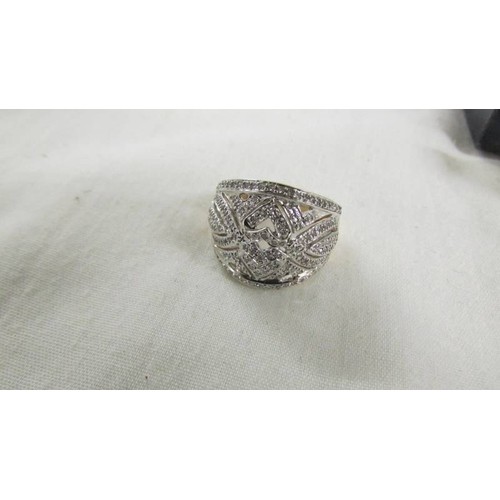 1040 - An ornate yellow gold diamond ring. size P.