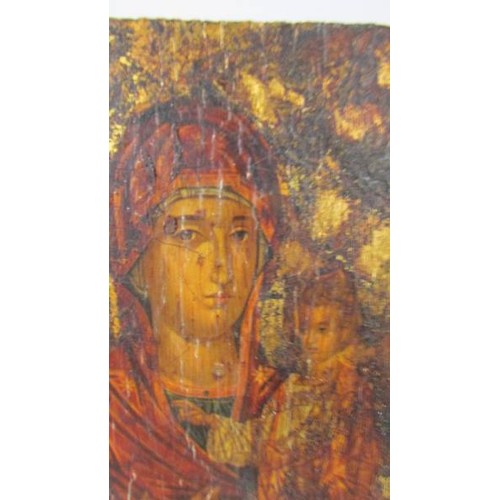 1227 - An antique hand painted icon on wood, 28.5 x 12 cm.