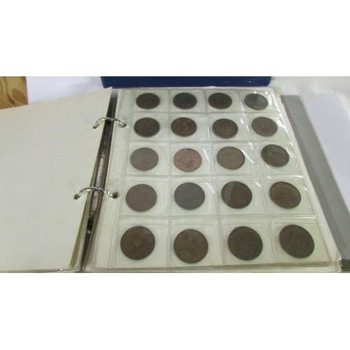 1171 - Two albums of UK and foreign coins.