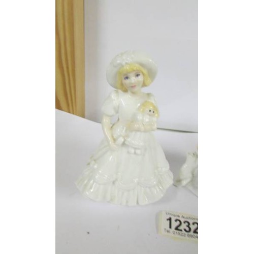 1232 - A Royal Worcester figurine, Katie and a Royal Doulton figure Andrea Hn 3058.