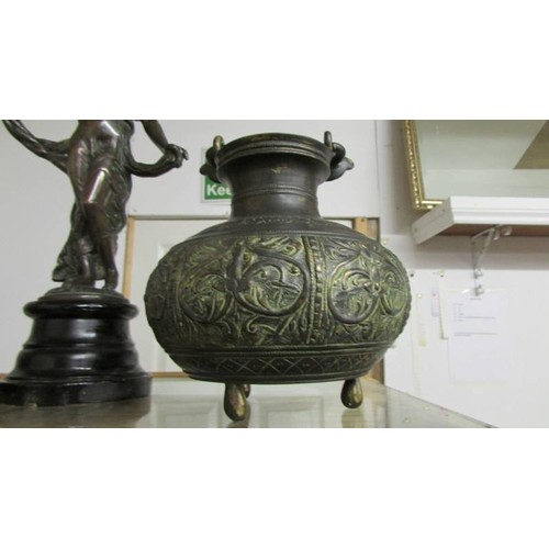 1244 - A bronze female figure, a bronze oriental pot and a brass cherub candlestick.