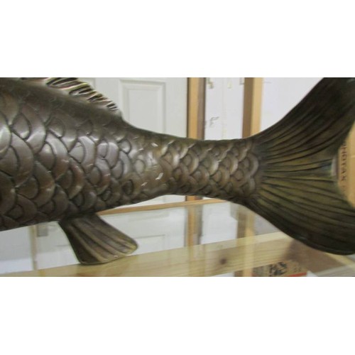 1246 - A large bronze Koi carp, 58 cm long and 27 cm high.