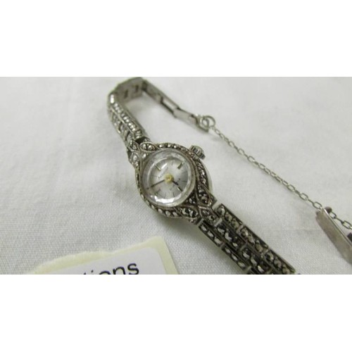 1010 - An Accurist silver marcasite ladies wristwatch.