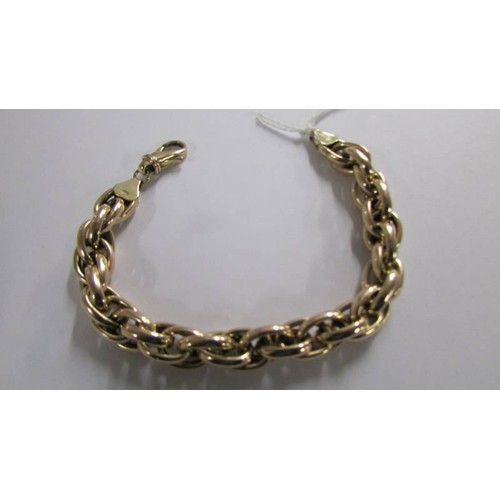 1048 - A 9ct gold bracelet, 15 grams.