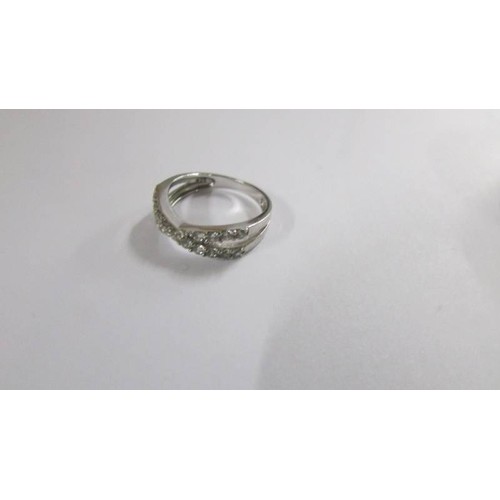 1053 - A silver bangle and a silver ring, 16 grams.