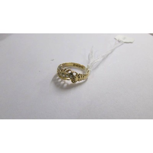 1058 - An 18ct gold ring set diamonds, size L. 3.3 grams.