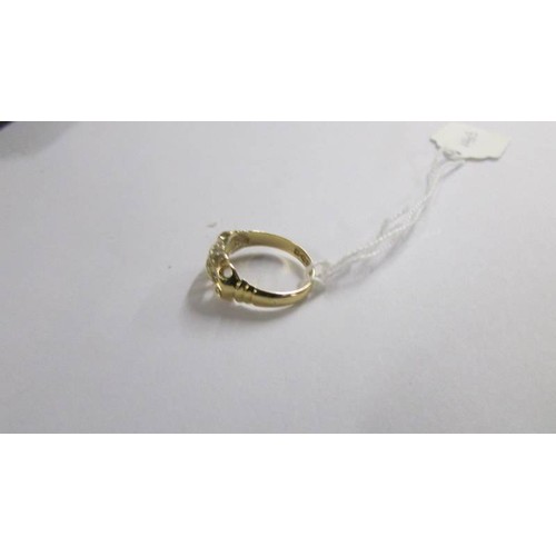 1058 - An 18ct gold ring set diamonds, size L. 3.3 grams.