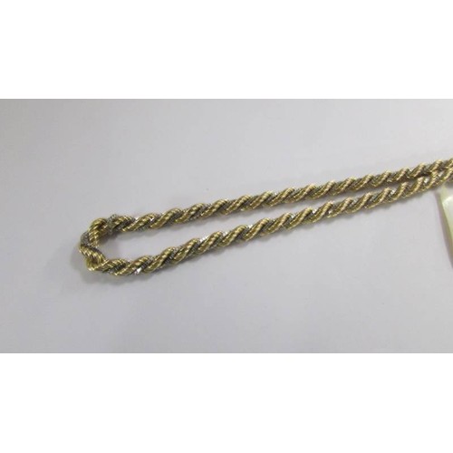 1066 - A 9ct gold rope twist necklace, 12 grams.