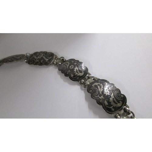 1068 - A Russian provincial silver and nickel linked belt with assay marks dated 1866.