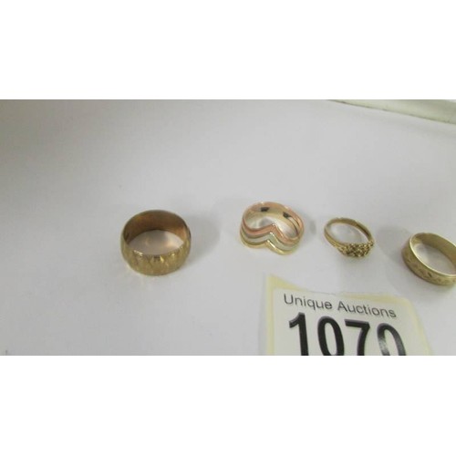 1070 - Five 9ct gold rings, 13.9 grams.