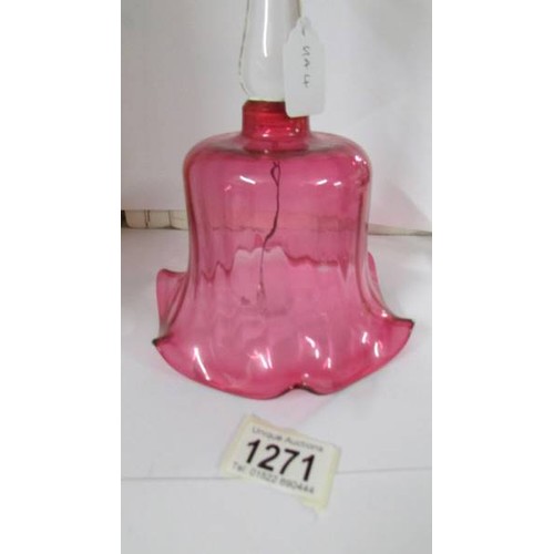 1271 - A Victorian cranberry glass bell in good condition.