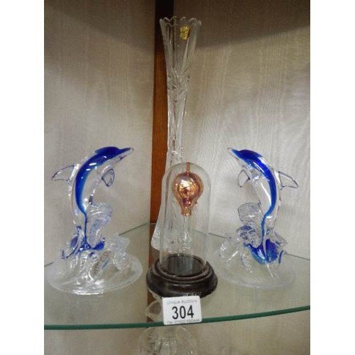 304 - Two glass dolphins, a cut glass vase and a glass hot air balloon under dome.