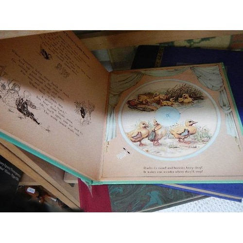 318 - Two photo albums and another book.