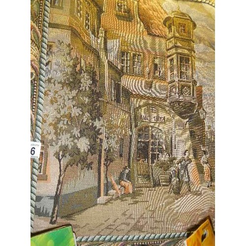 376 - A tapestry wall hanging of a classical Italian? street scene, 58 x 64 cm.