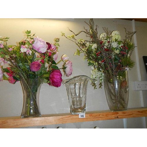 380 - Three glass vases and a quantity of faux flowers and branches. COLLECT ONLY