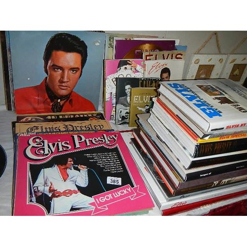 385 - A quantity of Elvis LP records and hard back books. COLLECT ONLY