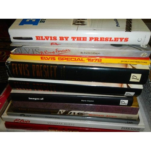 385 - A quantity of Elvis LP records and hard back books. COLLECT ONLY