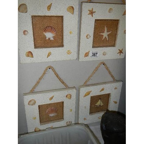 387 - Four seashell themed bathroom wall hangings, 20 x 20 cm.