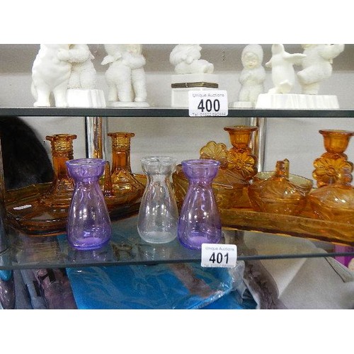 401 - An art deco amber glass trinket set and three small glass vases.